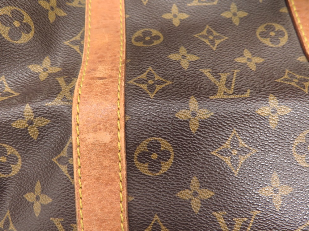 Vuitton - Bag - Hand - Pochette - M51980 – Sac de voyage Louis Vuitton  Keepall 55 cm en toile monogram marron et cuir naturel - Monogram - Louis -  Prix des sacs Louis Vuitton L'aimable d'occasion - Accessoires