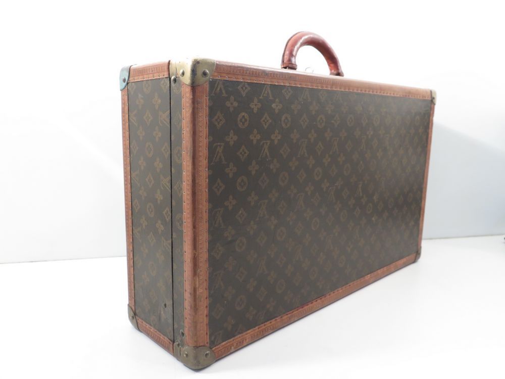 Sac-valise de vêtement portatif monogramme vintage de Louis Vuitton –  Boutique LUC.S