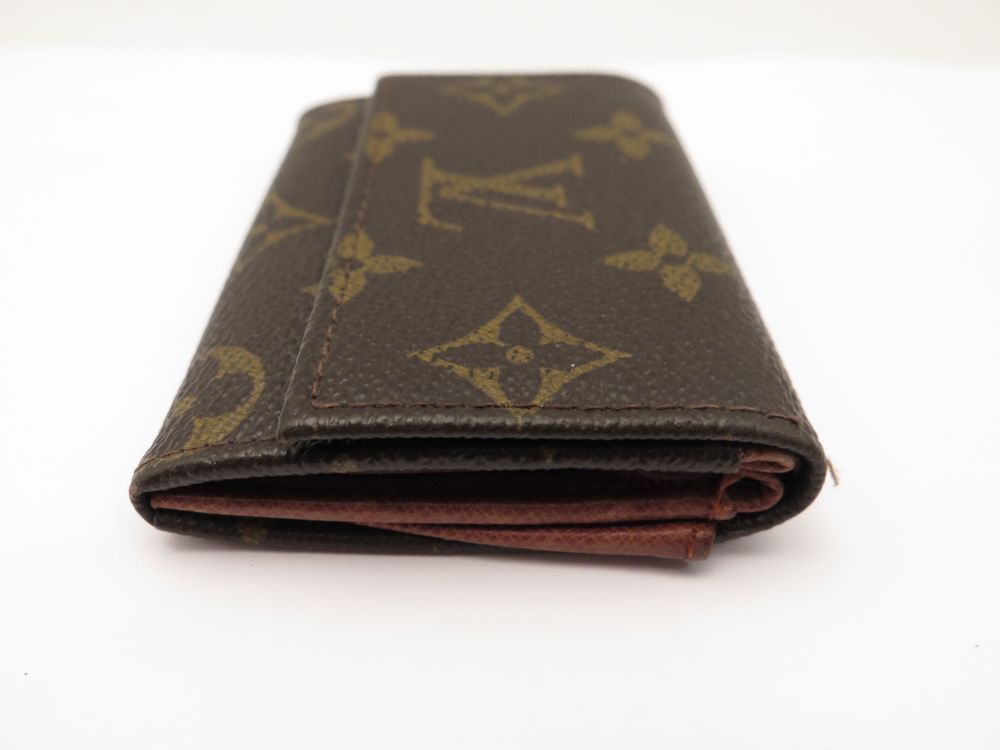 Louis Vuitton Zippy Wallet Pompon Pivone - A World Of Goods For