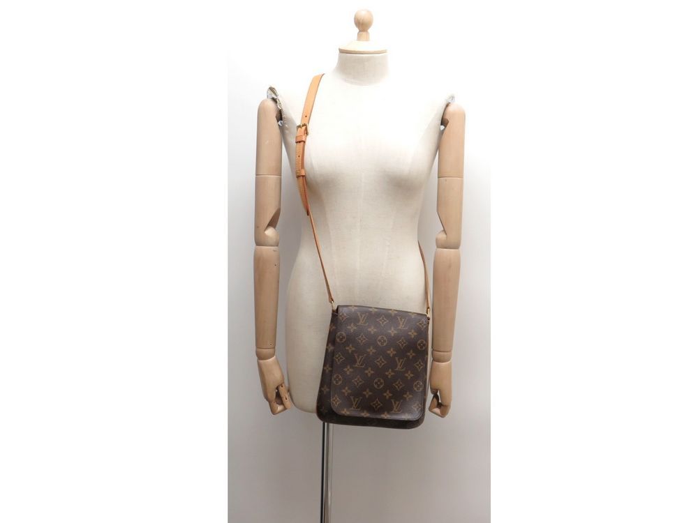 Sac à main Louis Vuitton Salsa en toile monogram marron et cuir