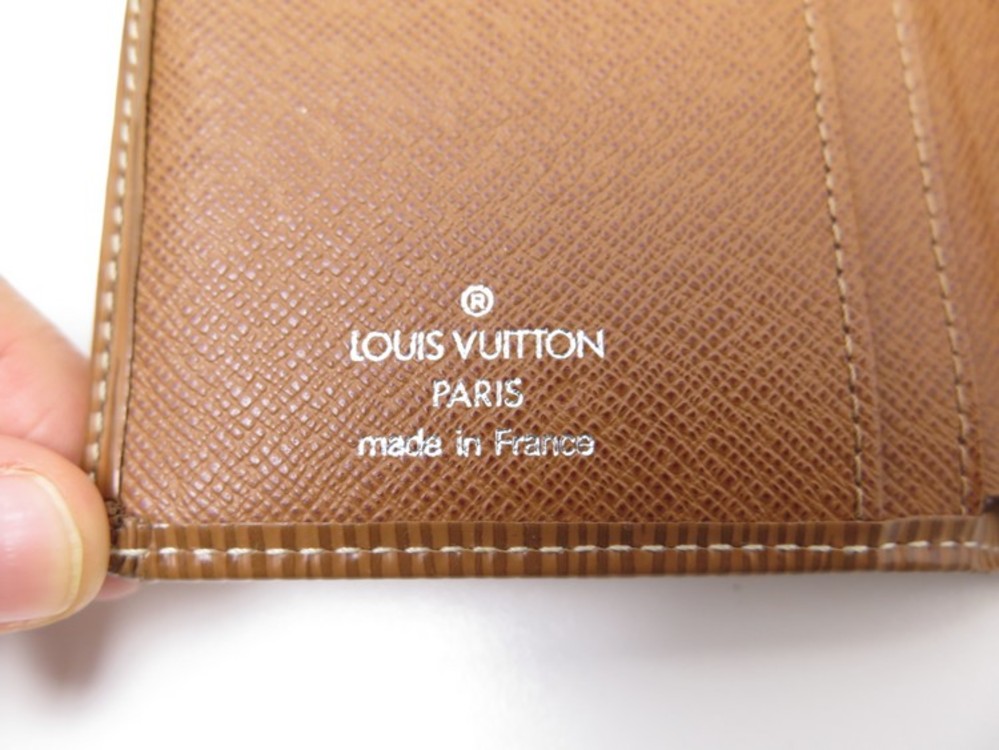 Portefeuille emilie en cuir Louis Vuitton Marron en Cuir - 31894994