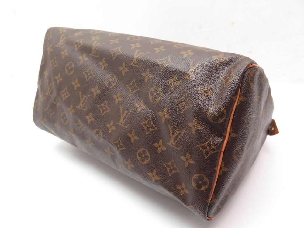 Sac à main speedy en toile Louis Vuitton Brown in Cloth - 35749095