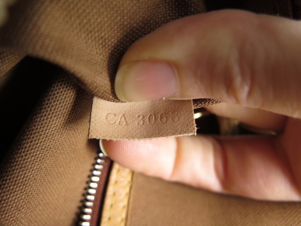 Sac à main Louis Vuitton Batignolles petit modèle en toile monogram marron  et cuir naturel