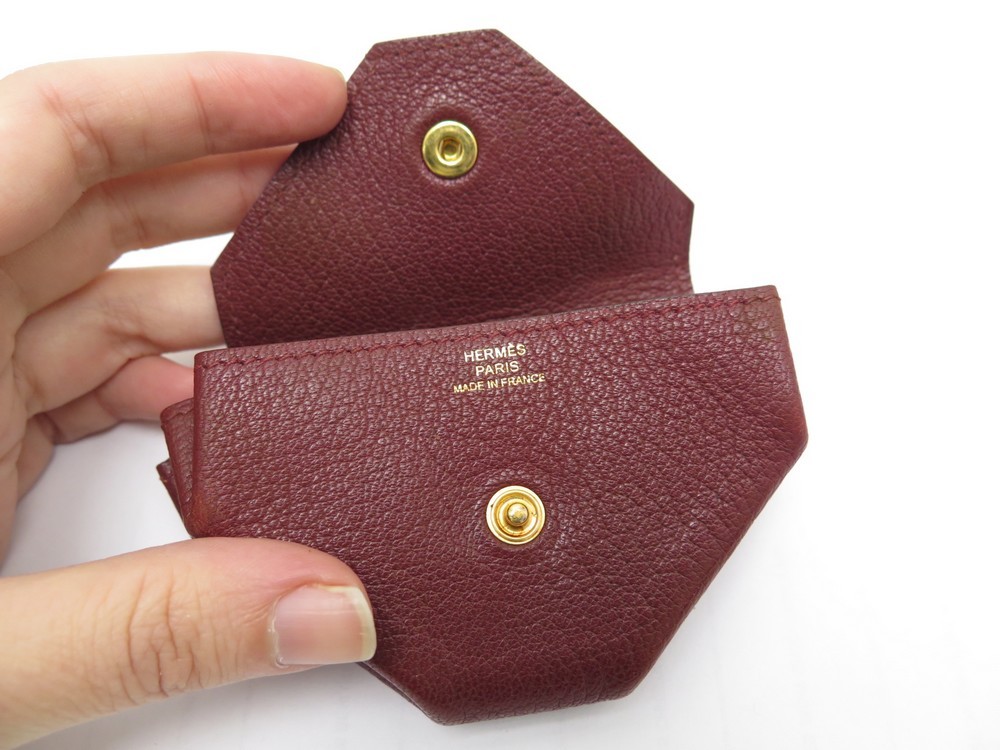 porte monnaie hermes 24 en cuir bordeaux burgundy