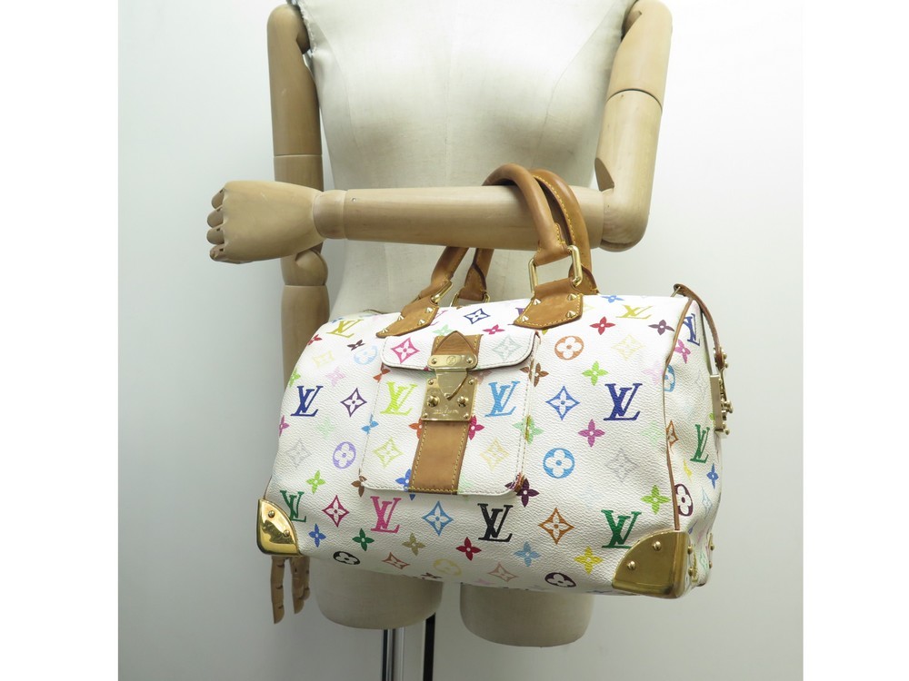 LOUIS VUITTON Speedy - Sac porté main en toile enduite…