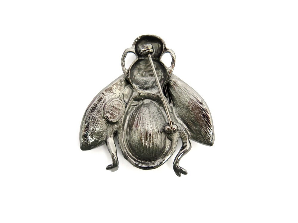 broche christian dior abeille en metal noir