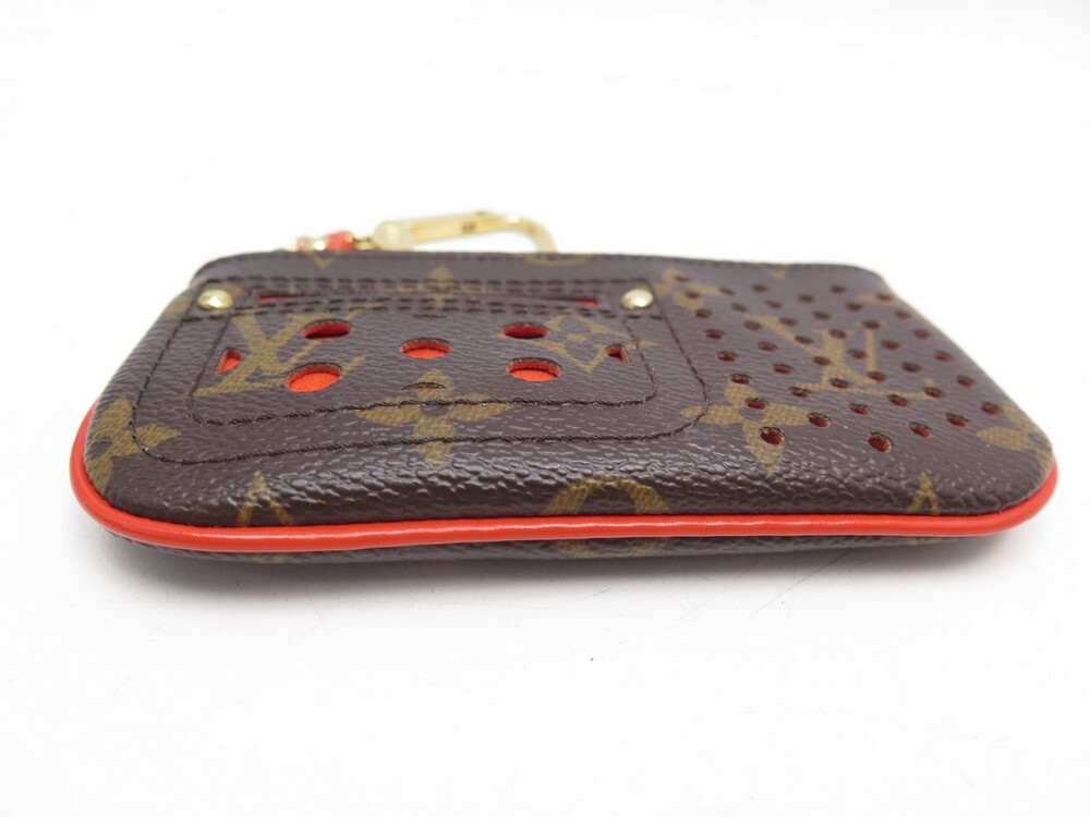 Louis Vuitton Limited Edition Orange Monogram Perforated Pochette