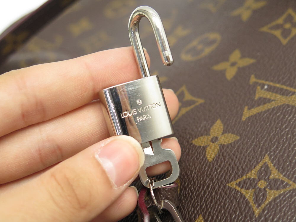 Louis Vuitton Key Holder LV Initials Silver in Polished Silver